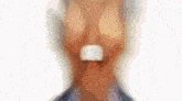 a blurry image of a man in a suit and tie