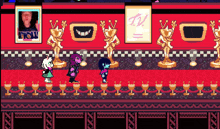 a video game with a red carpet and trophies and a sign that says tv