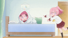 a girl with pink hair is standing next to another girl with pink hair