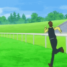 a man in a red jacket is running on a grassy field .