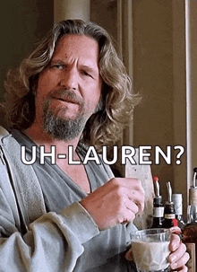 a man with long hair and a beard is holding a cup of coffee and asking uh-lauren ?
