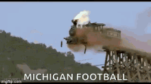 Michigan Football Train Fell GIF - Michigan Football Train Fell Flaming Train GIFs