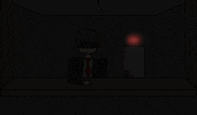 a man in a suit and tie is sitting at a table in a dark room with a red light .