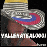 a picture of a woman wearing a hat that says vallenatealooo