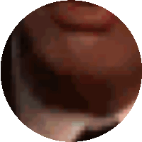 a close up of a person 's face in a pixelated circle