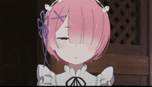 a close up of a girl with pink hair