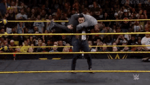 Hideo Itami Bobby Roode GIF - Hideo Itami Bobby Roode Wwe GIFs