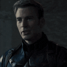 a bisexual flag with a man 's face behind it