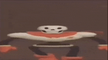 papyrus from undertale is a robot with a skull on his head and arms .