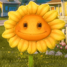 a cartoon sunflower with a face is standing in the grass .