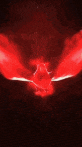 a red sphere with wings is floating in the air