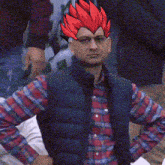 a man wearing a plaid shirt and a black vest has a red headpiece on