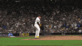a baseball game is being played in front of a del rey advertisement