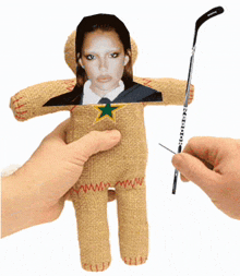 a gingerbread man with a picture of a woman and a hockey stick