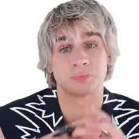 a young man with blonde hair is wearing a black and white shirt with a star pattern