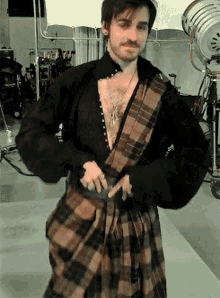 Killian Jones Wearing A Traditional Scottish Kilt Tartan GIF - Killian Jones Wearing A Traditional Scottish Kilt Tartan Once Upon A Time GIFs