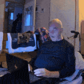 an elderly man is using a hp laptop computer