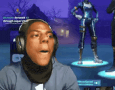 a man wearing headphones and a scarf is playing a video game on a computer screen .