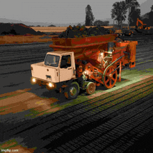 a white truck with a cow on the side is driving down a dirt road