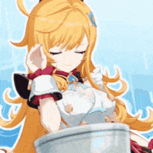 a girl with long blonde hair is sitting in front of a bucket