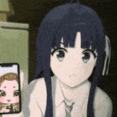 a girl in a tie is taking a picture of herself with a cell phone