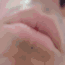 a close up of a person 's mouth with hearts floating around it
