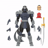 a toy figure of a samurai with a sword and a red head