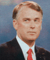 a close up of a man 's face with a blue background