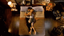 a man and a woman are laying on a bed with the words rapunzelsdiary written on the bottom