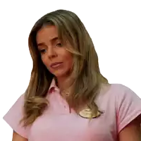 a woman wearing a pink shirt with a name tag that says vega