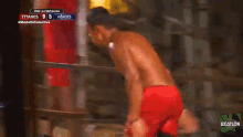 a boxing match between titanes and heroes with a score of 95 to 5