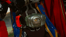 a close up of a person 's torso with a light shining on it