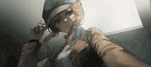 a girl wearing a hat and a brown jacket
