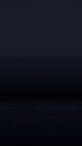 a dark background with a purple light coming out of the middle