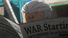 a man is reading a newspaper that says war startin on it