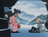 a man and a woman standing in the snow