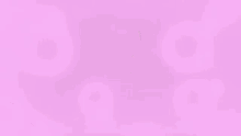 a man wearing glasses is sitting in a chair in front of a computer screen surrounded by pink bubbles .