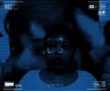 a blurry picture of a person taking a picture with a camera