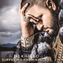 dj khaled suffering from success album cover showing a man covering his face