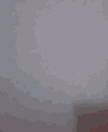 a close up of a person 's middle finger on a white background .