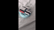 a person is playing with a toy that looks like a piano .