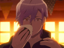 a person with purple hair is holding a white object