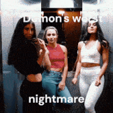 three women in an elevator with the words demon 's worst nightmare