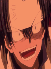 a close up of a person 's face with a slight smile on it