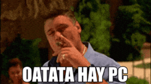 a man smoking a cigar with the words oatata hay pc written above him