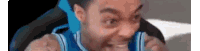 a man in a blue and white basketball jersey is making a funny face .