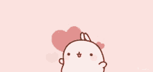 a cartoon of a rabbit with hearts behind it
