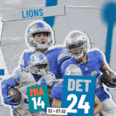 a group of football players are holding signs that say mia 14 det 24