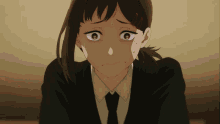 a close up of a girl 's face with a tear running down her cheek