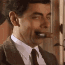 Mr Bean Sausages GIF - Mr Bean Sausages Funny Face GIFs